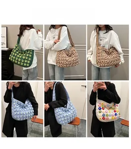 Detailed views of quilted cloud tote bag with crochet flower accents in various colors