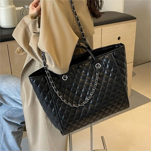 Chic black quilted tote bag with diamond pattern and chain strap for women