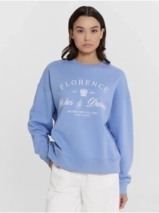 Detail of light blue sweatshirt with vintage Florence print and ribbed crew neck