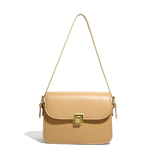 Elegant khaki leather crossbody bag with vintage bronze square buckle on white background
