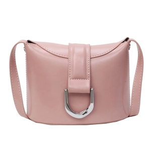 Pink minimalist saddle bag with silver D-buckle on a clean white background