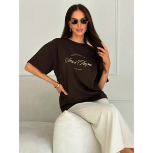 Brown oversized cotton T-shirt with gold Saint Tropez print for a relaxed summer look