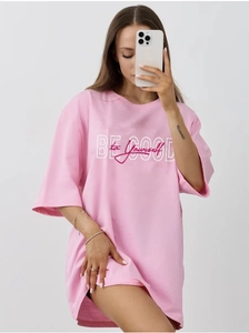 Close-up of BE GOOD to yourself letter print on a pink cotton oversized t-shirt
