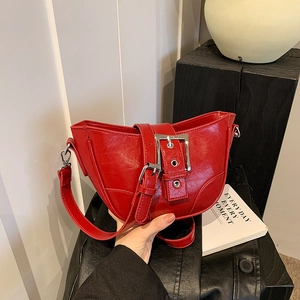 Retro red half-moon shoulder bag with glossy lychee texture and silver metal buckle