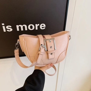 Pink crescent underarm bag with pleated texture and silver buckle in minimalist style