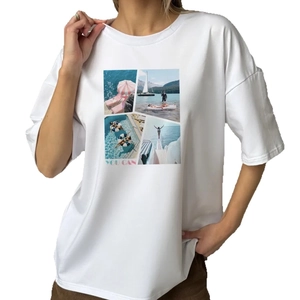 T-shirt blanc oversize en coton avec imprimé de plage coloré et texte YOU CAN pour l'été chic