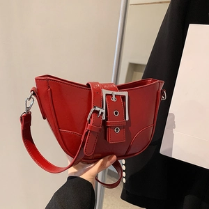 Retro deep red half-moon underarm bag in glossy patent leather with large silver buckle