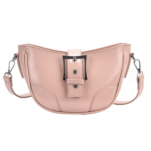 Pink vintage hobo bag with glossy finish and large silver buckle in a front view