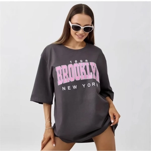 Women's dark grey cotton T-shirt featuring a pink Brooklyn New York 1898 graphic print