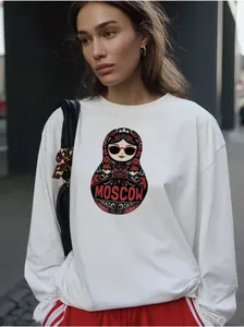 Detail of white cotton sweatshirt with stylish matryoshka print and Moscow text