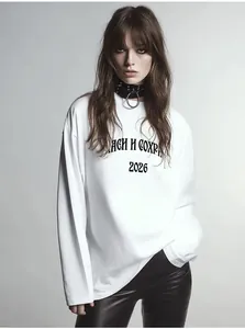 Close-up of Cyrillic print on white cotton long sleeve t-shirt with streetwear aesthetic
