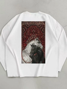 Detail of artistic twin horses print on white cotton sweatshirt with vintage rug background