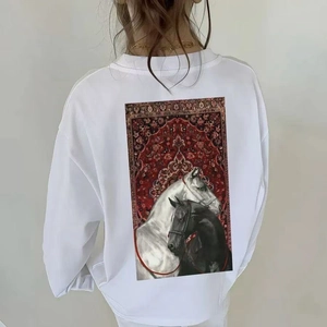 Back view of a white oversized cotton long sleeve tee with bohemian horse graphic print