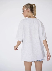Back view of light grey marl cotton t-shirt with oversized fit and crew neckline