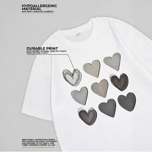 White cotton T-shirt with nine heart prints featuring soft breathable fabric for women