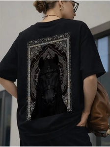 Detail view of oversized black cotton T-shirt featuring majestic horse and baroque back print