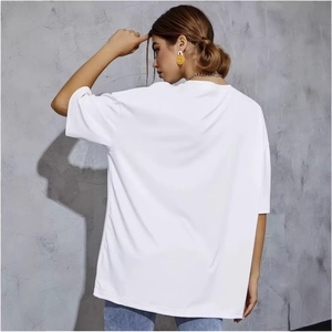 T-shirt blanc oversize 100% coton au design minimaliste avec épaules tombantes pour femme