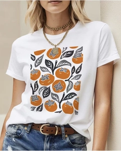 Detailed close-up of persimmon fruit print on white 100% cotton crewneck short sleeve t-shirt