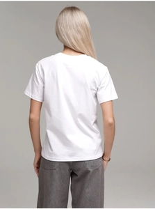 Rear view of white pure cotton T-shirt featuring classic round neck and relaxed fit design