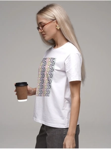 Detail of white cotton T-shirt featuring a colorful pixelated geometric diamond print