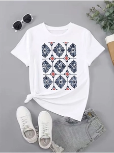 Flat lay of a white cotton t-shirt with floral print and casual grey denim shorts set