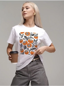 Detail of artistic orange persimmon print on a white cotton T-shirt for a casual summer style