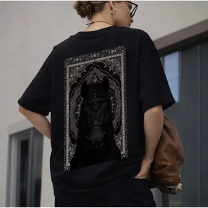 Street style black cotton t-shirt featuring a large gothic horse back print and loose fit
