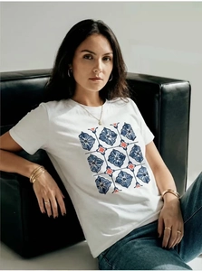 Close-up of geometric floral print on a white cotton T-shirt with modern styling