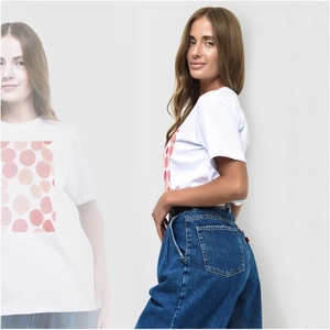 Women's white short sleeve t-shirt with red polka dot print and high-waisted blue jeans