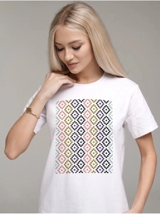 Detailed close-up of white cotton T-shirt featuring a modern geometric mosaic print