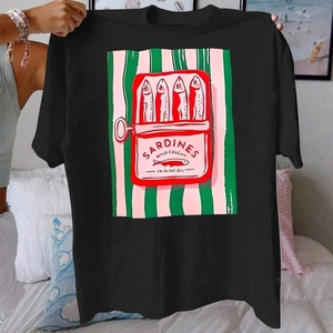 Women's black cotton T-shirt featuring a vintage sardine tin art print in bedroom setting