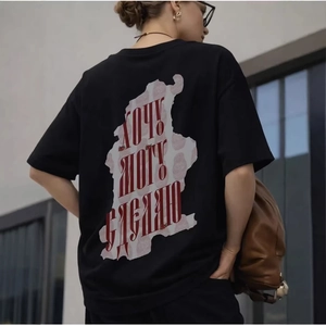 Street style black cotton T-shirt with large red artistic graphic print on the back