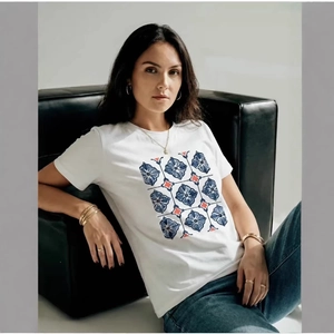 White cotton t-shirt with floral print styled with jeans and layered accessories
