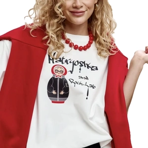 Oversize white cotton T-shirt featuring Matryoshka print paired with a red cardigan