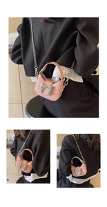 Detail of pink bow shoulder bag with silver chain strap shown on model from back and side view
