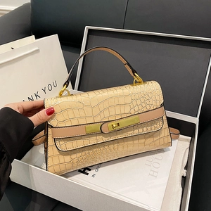 Borsa beige goffrata coccodrillo stile Kelly con chiusura dorata e manico superiore elegante