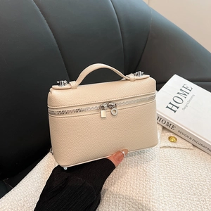 Minimalist beige pebble leather square tote with top handle and double zippers