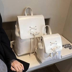 Minimalist white PU leather backpack set with drawstring detail and sweet bow decoration