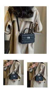 Three-way view of a black quilted crossbody bag with silver twist lock on a trench coat model