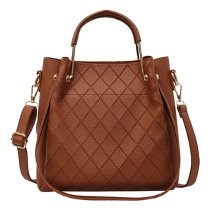 Brown quilted bucket bag for women with top handle and adjustable crossbody strap