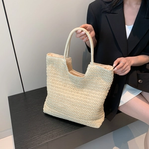Sac cabas en paille tressée beige avec anses rondes pour la plage ou le bureau