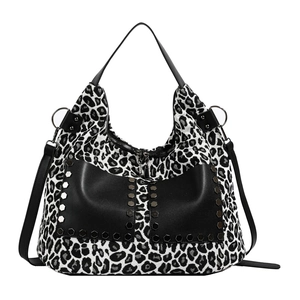 Retro black and white leopard print hobo tote bag with rivet bow and adjustable strap
