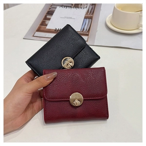 Litchi pattern leather mini wallets in black and burgundy with gold rotary buckles