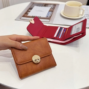 Women's multi-slot leather wallet in brown and red with RFID protection and card slots