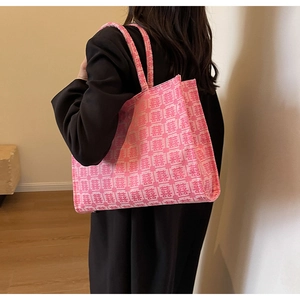 Detailed side view of pink wedding canvas tote bag with traditional囍 jacquard patterns