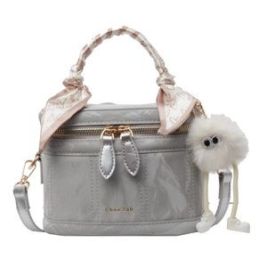Grey textured leather box handbag with heart scarf wrap and plush charm accessory