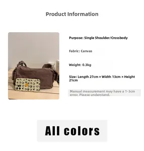Detail view of dark brown canvas crossbody bag dimensions 27x13x21cm and specs