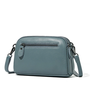 Morandi blue pebbled leather crossbody bag for women with multi-zipper and adjustable strap