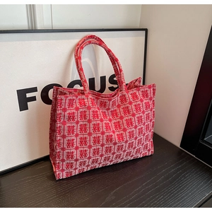 Close-up of red Double Happiness wedding tote bag made of durable woven canvas material