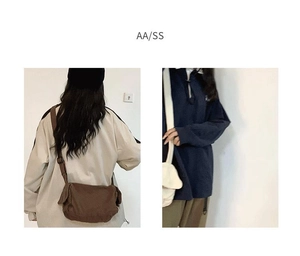 Detail showing brown washed canvas crossbody bag with adjustable wide shoulder strap